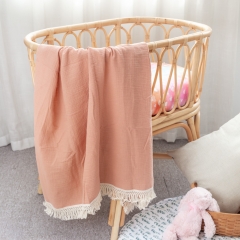 Peach swaddle blanket with tassels for newborn photography